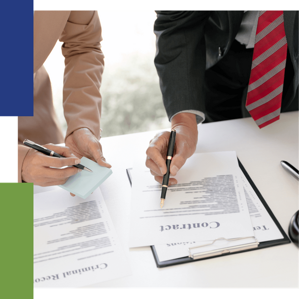 Men reviewing a contract